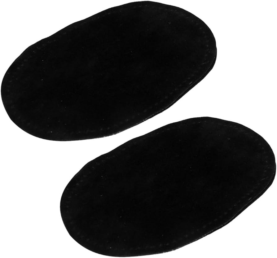 Two black oval fabric patches with stitched edges, shown on a plain white background.