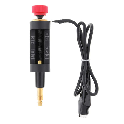 Black electronic component with red cap and cable on a white background