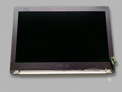 Laptop screen with brand logo on a gray background