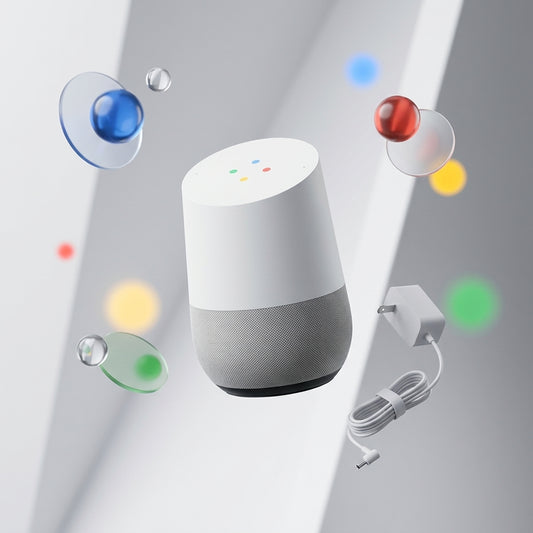 A Google Home smart speaker device in white and gray, shown floating with its charging cable and wall plug nearby, surrounded by colorful floating bubbles on a light gray background.