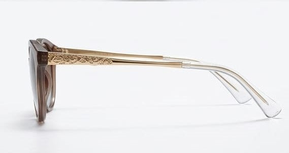 Valentino Sunglasses in Pakistan – Sunglasses with Gold Frame and Clear Arms on a White Background