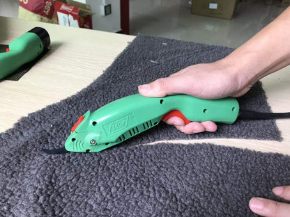 WBT-2 cordless electric scissors cutting UHMWPE UD fabric, aramid, and carbon fiber materials