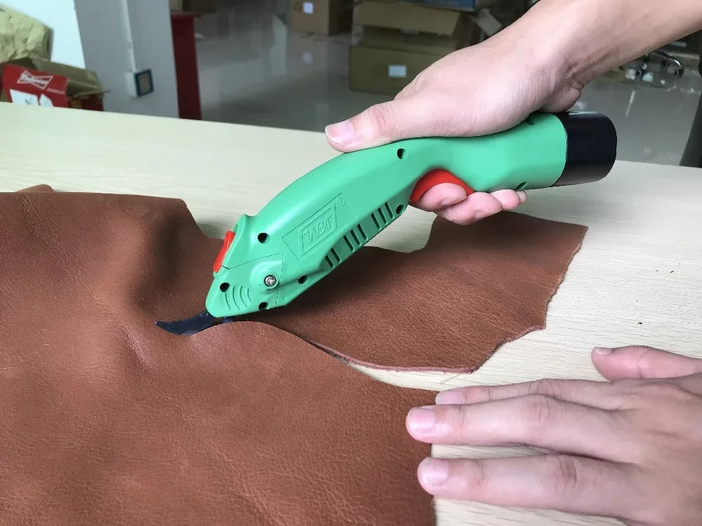 WBT-2 cordless electric scissors cutting UHMWPE UD fabric, aramid, and carbon fiber materials