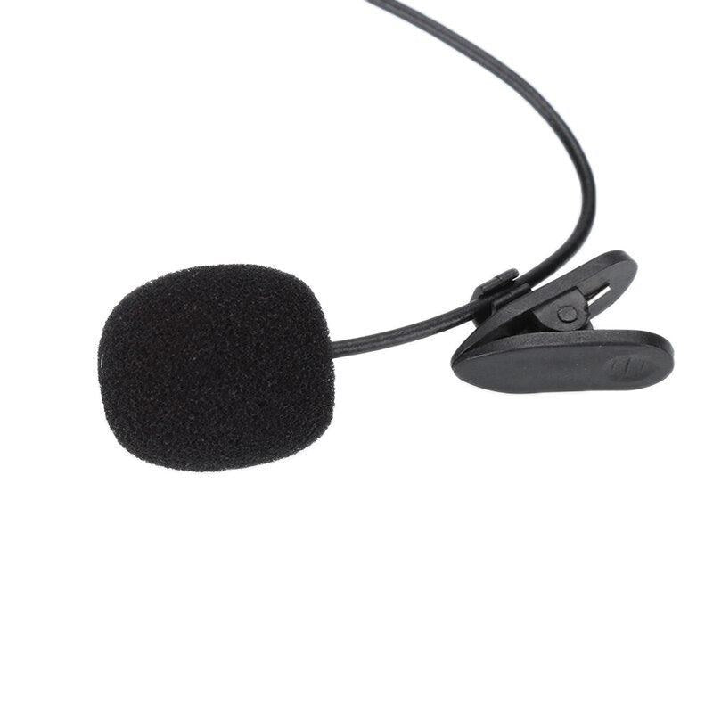 Black lavalier microphone with clip on a white background