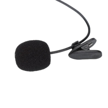 Black lavalier microphone with clip on a white background