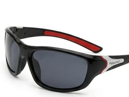 stylish sunglasses with black frame and red accents on white background