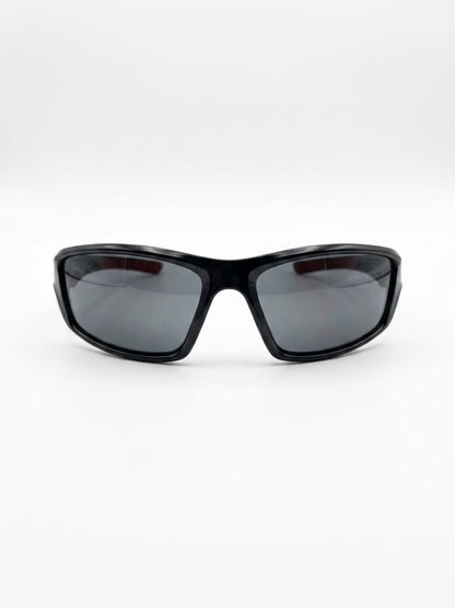 stylish sunglasses with black frame and dark polarized lenses on white background