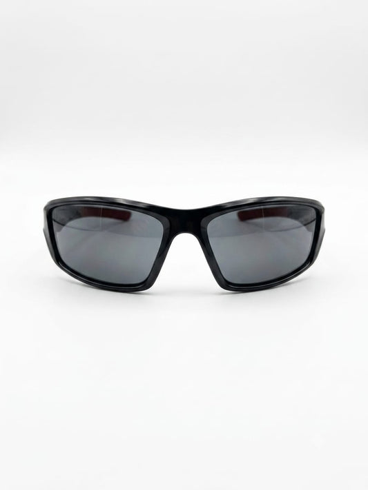 stylish sunglasses with black frame and dark polarized lenses on white background