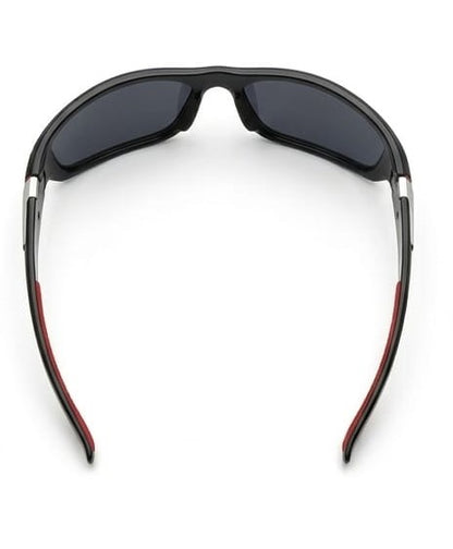stylish sunglasses with black lenses and red accents on white background